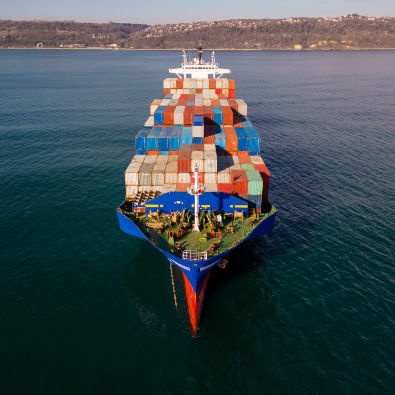 Aerial top view container ship, shipping or transportation concept background.