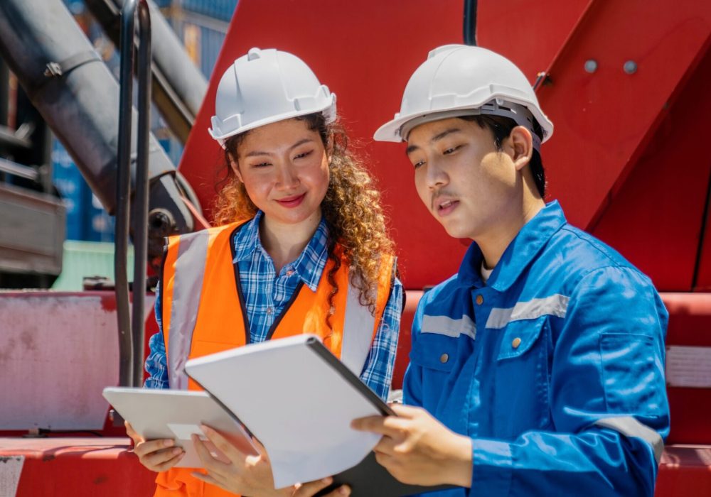 Engineer staff team checking and inspect container for international business logistic import and export concept.
